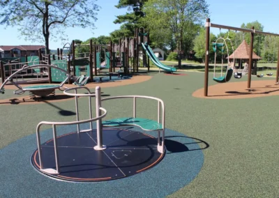 Park in Tomah featuring play structures and activity areas for children.