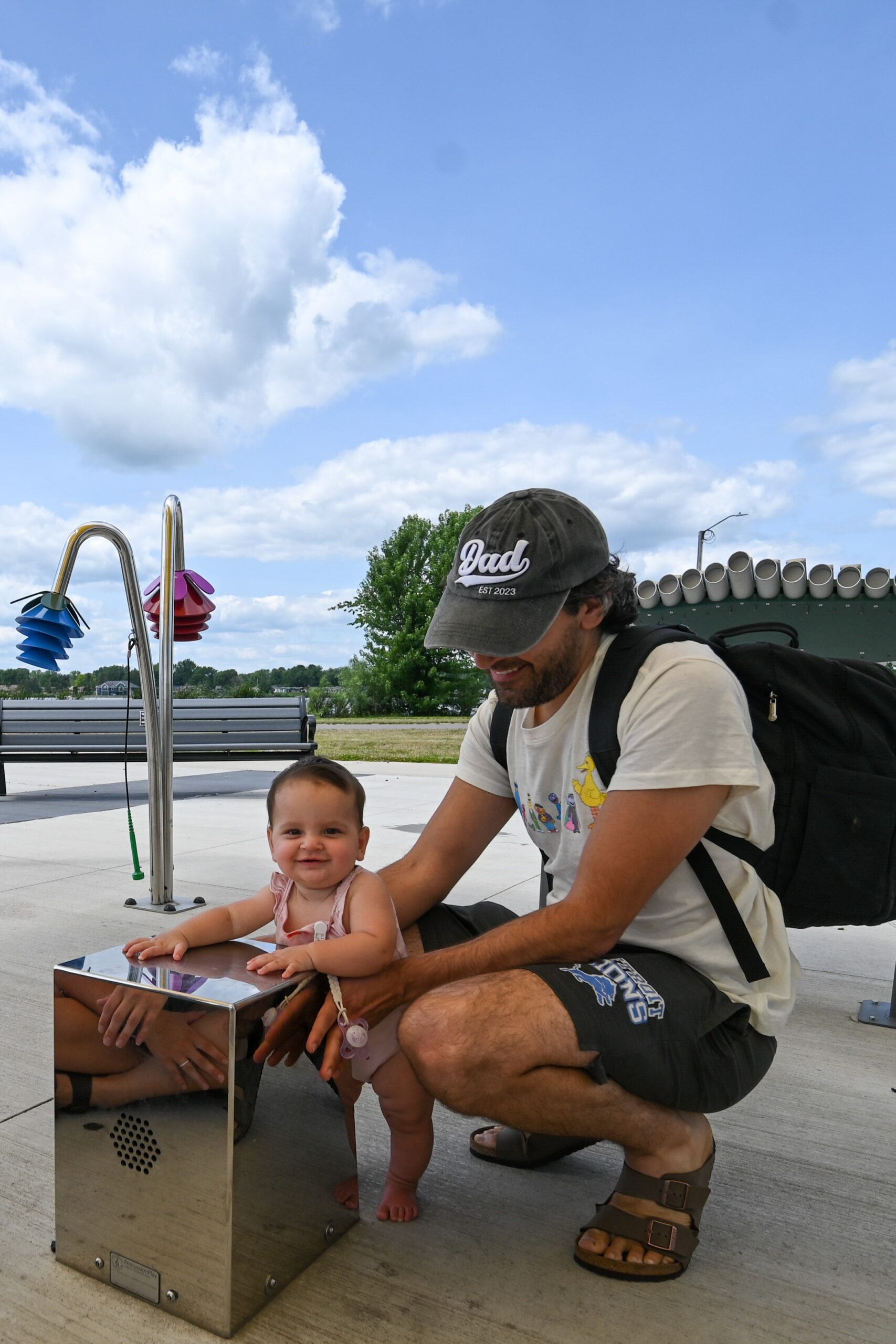 A dad and daughter playing at Winnebago Park