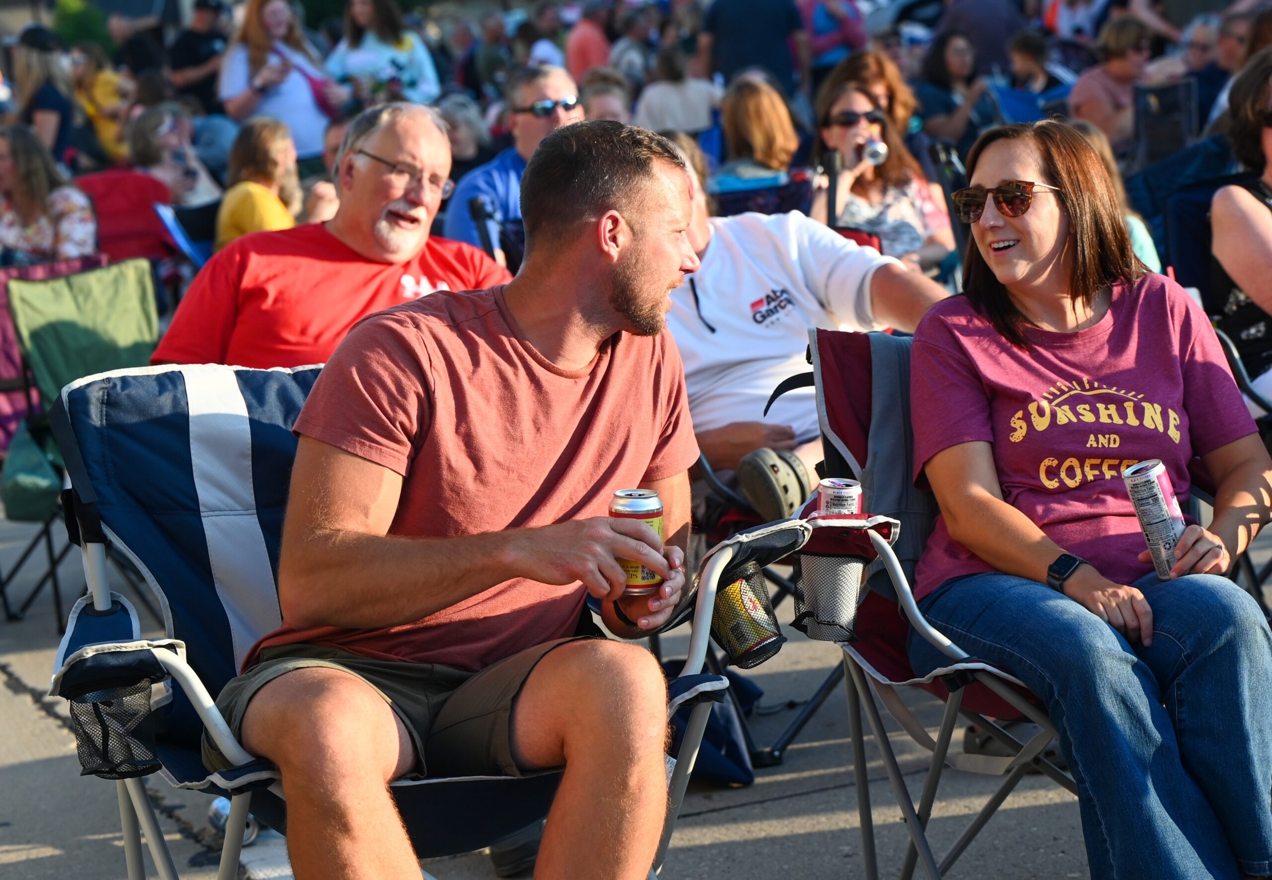 A couple smile at each other while in the crowd at Thursday Night music