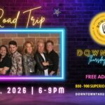 A poster in neon colors with the band Road Trip on it.