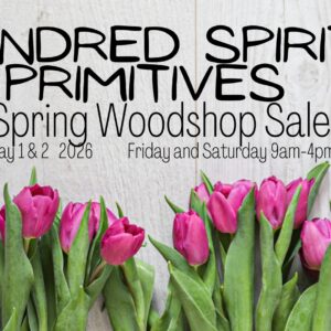 A poster with the event information on it and flowers on it.