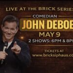 A poster showing a picture of Comedian John DeBoer.