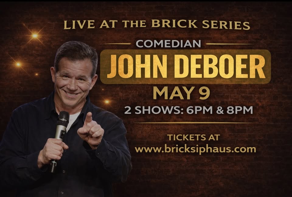 A poster showing a picture of Comedian John DeBoer.