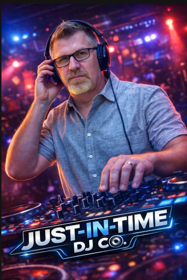 A photo of a man DJing.