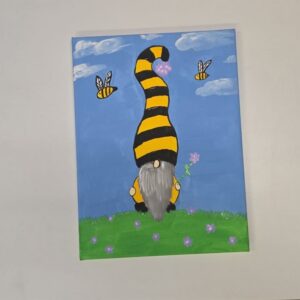 A gnome with bumble bees