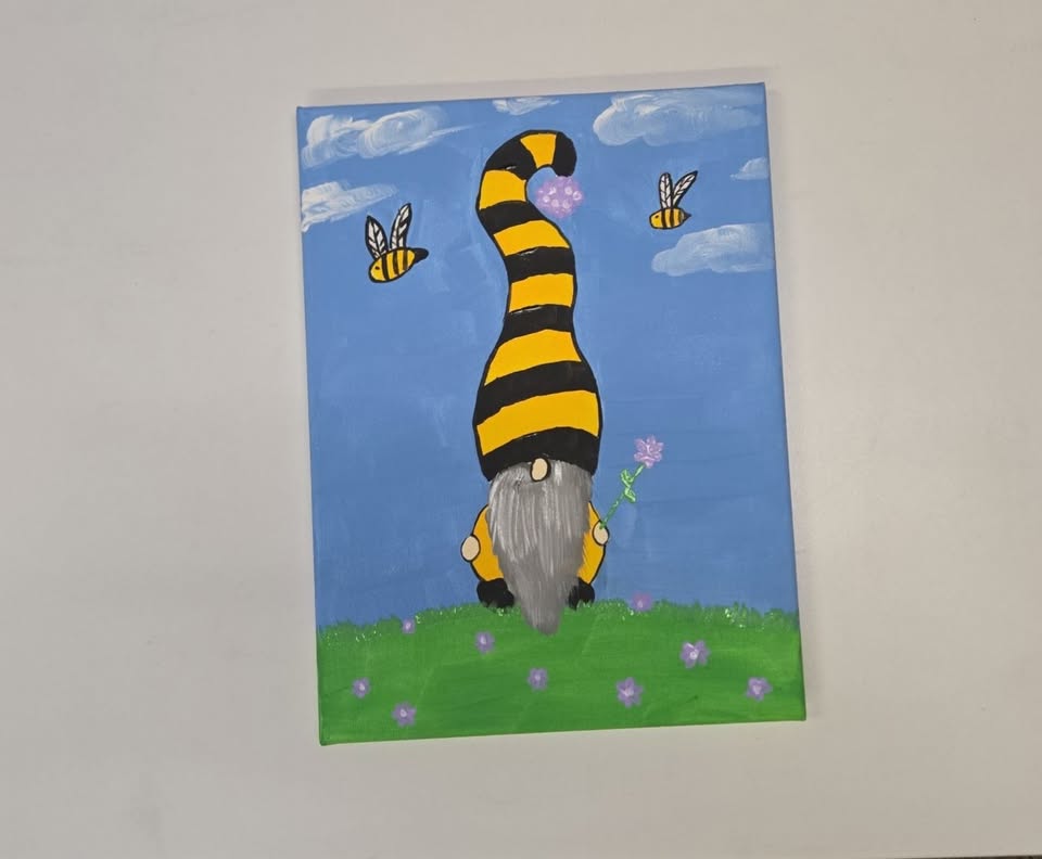 A gnome with bumble bees