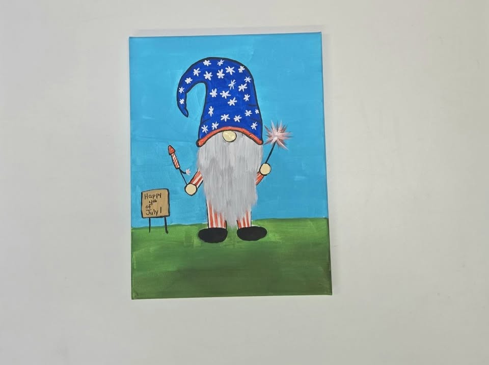 a canvas painting of a gnome dressed in red white and blue