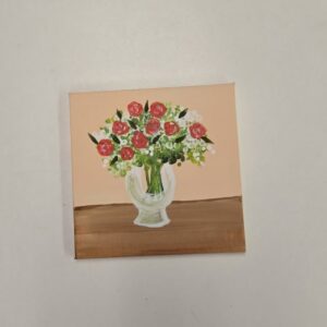 canvas painting of a vase full of roses