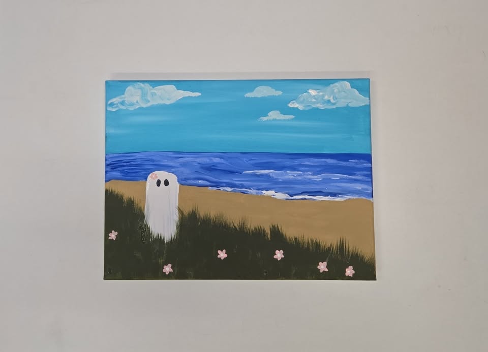 a canvas painting of a ghost on the beach