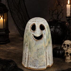 a glazed ceramic smiling ghost