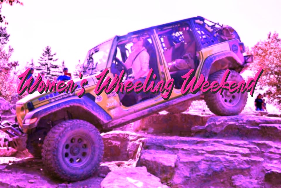A woman driving a UTV off road